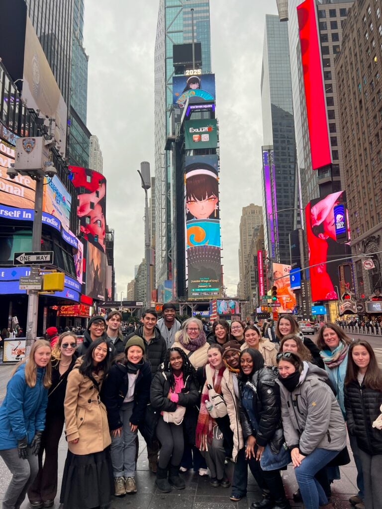 students standing in a group in times square