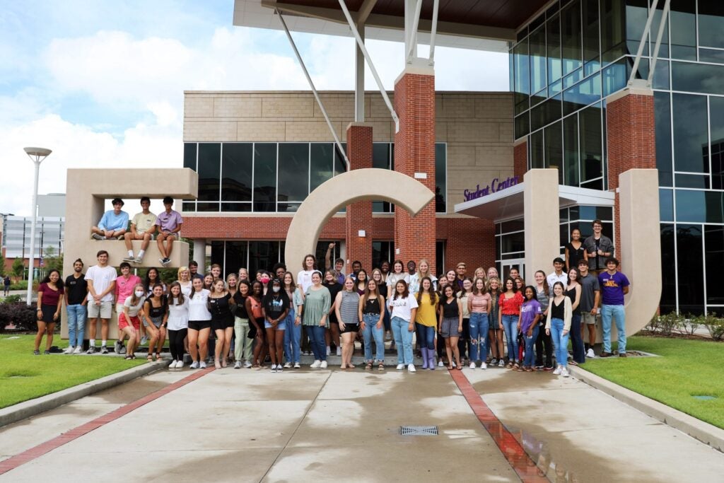 group photo of EC Scholars in front of ECU letters