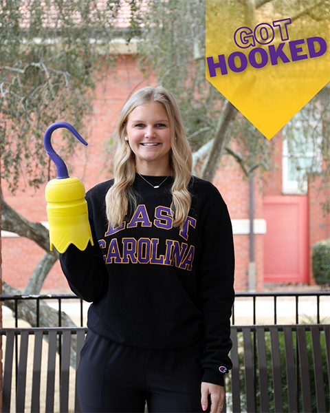 female student holding 3D printed hook