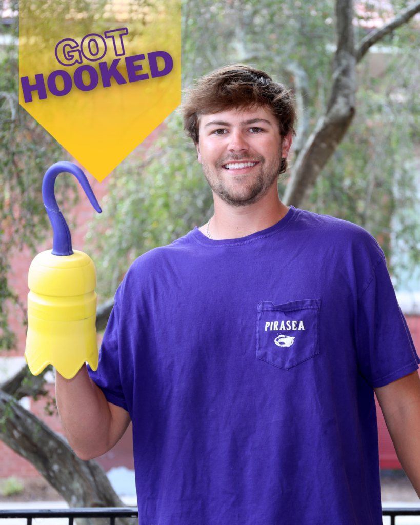 Ryan Hodges holding the honors 3D printed hook