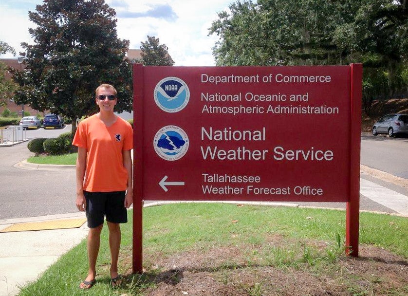 ECU Honors College alumnus Thomas Vaughn (Class of 2015) stands in front of the National Weather Service Station in Tallahassee, Fla. Vaughn will start his career with the NWS this September at the Wichita, Ka. office.