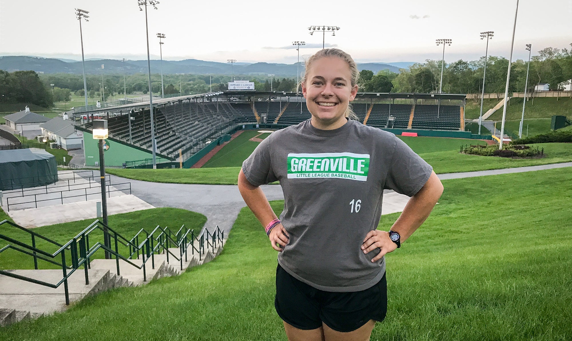 Rising Junior Ashely Weingartz stands in front of the Little League World Series complex in Williamsport, Pa., where she is serving as the marketing intern this summer. 